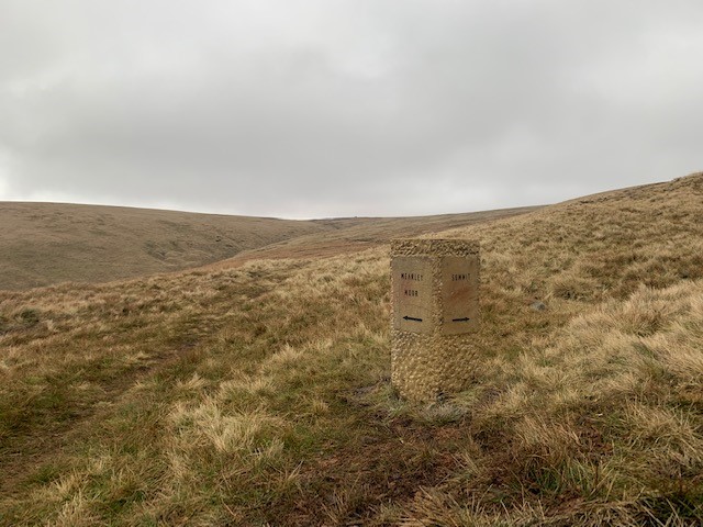 One of the new stone way markers installed on Pendle Hill