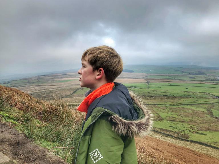 Aleks enjoying a breath of fresh air in the shadow of Pendle