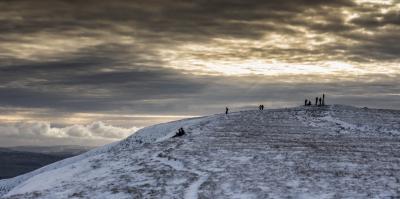 A winters afternoon at the summit of Pendle Hill 