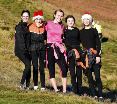 Clayton le moors harriers juniors on there tredtional Christmas run up Pendle hill. 